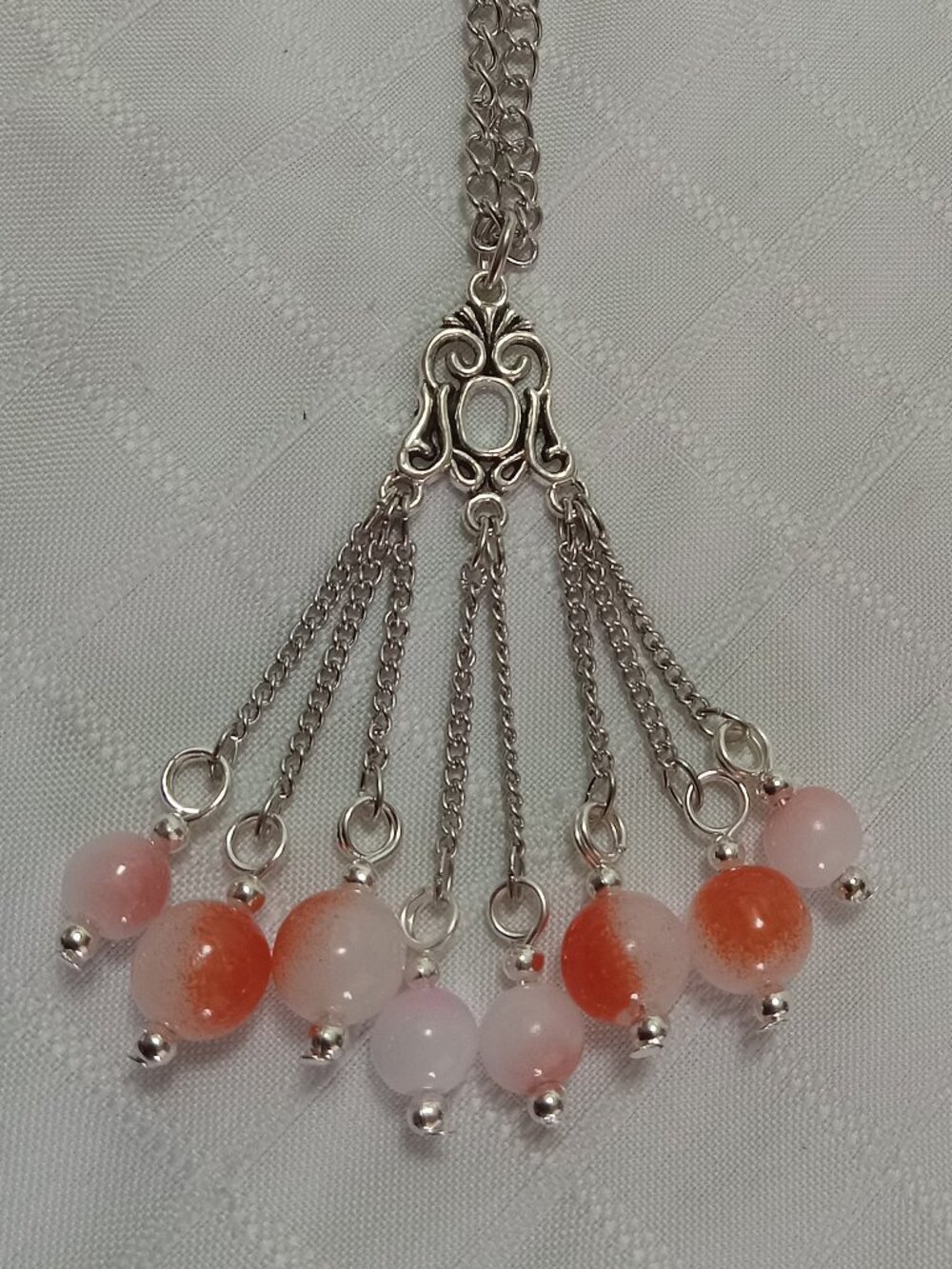 Exquisite handmade necklace featuring a gorgeous Tibetan silver charm
